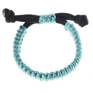 The Bracelet Turquoise by Hobby Horse LarDen features light blue and black braided cords with a square knot pattern and adjustable closure, shown on a white background—ideal for pairing with your rope set or as a stylish Hobby Horse accessory.