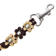 A close-up of the Hobby Horse LarDen Lead Rope Bloom Brown, braided in beige and brown with silver beads and a shiny metal clasp—ideal for leading or lunging your hobby horse.