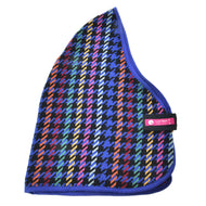 The Hobby Horse LarDen Stable Blanket Peru features a colorful houndstooth pattern with blue trim, black strap, and pink-and-white LarDen logo tag. The fabric mixes vibrant red, yellow, green, and blue tones.