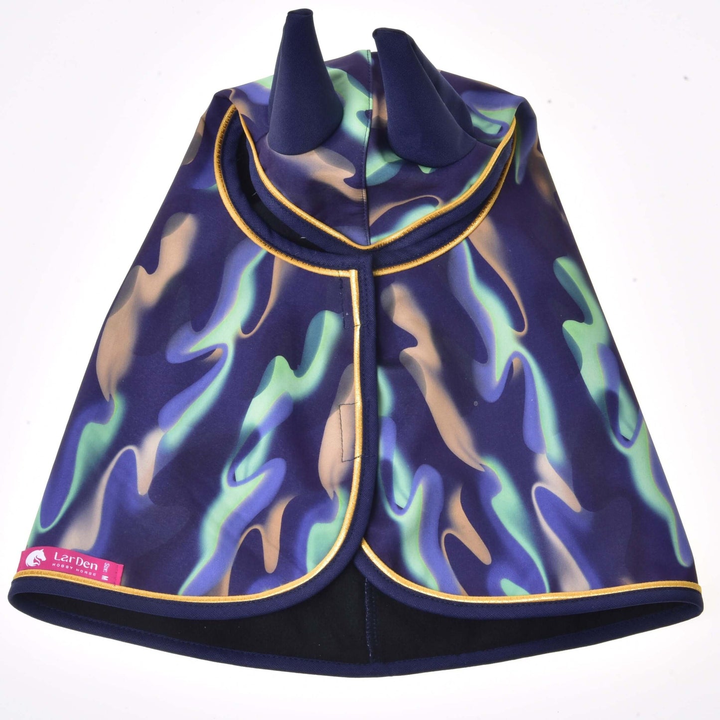 The Raincoat rainbow by Hobby Horse LarDen is a blue and green camo-patterned dog softshell with two soft horns on top, gold trim, and a pink Let Don label on the bottom left corner.