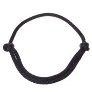 The Cordeo black by Hobby Horse LarDen is a handmade, adjustable cordeo rope in black with side knots—ideal for bridleless riding or hobby horse activities.