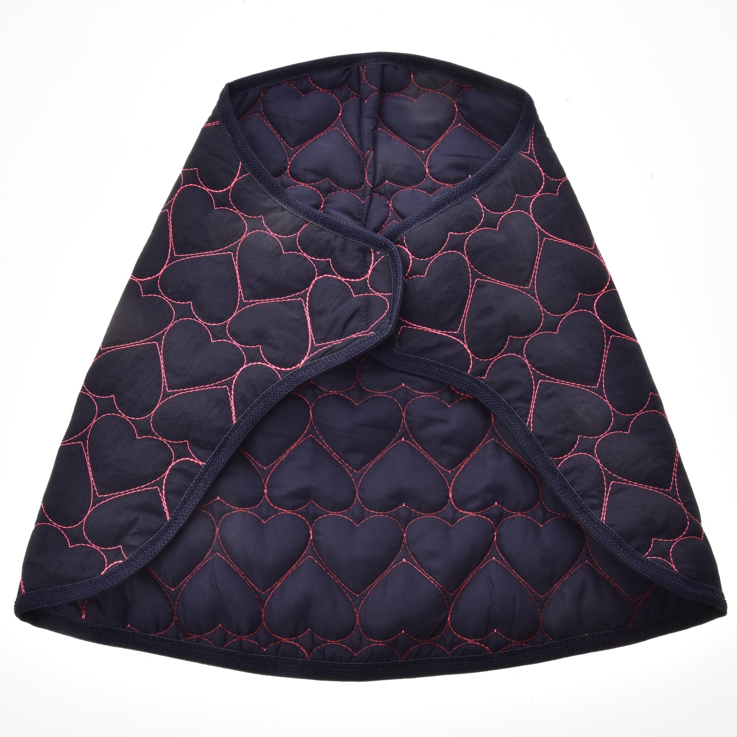 Blanket Pink Heart by Hobby Horse LarDen is a dark blue quilted cape with pink heart-shaped stitching, inspired by a warm horse blanket, and features a curved front opening, shown against a white background.
