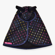 The Hobby Horse LarDen Raincoat Sparkling Queen is a black cape with colorful diamond patterns, two soft black horns on the hood, and a pink Laz Pet label at the hem, shown laid flat on a white background.