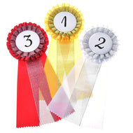 The Set Hobby Horse Ribbons NEW by Hobby Horse LarDen includes gold (1st), silver (2nd), and red (3rd) ribbons with rosette tops and long tails, perfect for awarding top spots in competitions.