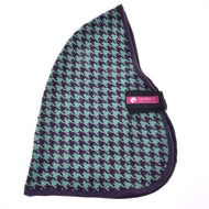 The Stable Blanket Green by Hobby Horse LarDen features a teal and black houndstooth pattern, curved shape, dark trim, black strap, and a pink LarDen label—perfect as a stylish and unique clothing accessory.