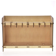 The Hobby Horse LarDen Stable for 3 Hobby Horses is a plywood rack with hooks and slots, a light natural finish, flat base with circular holes, and an open front—perfect for organizing or hanging items.